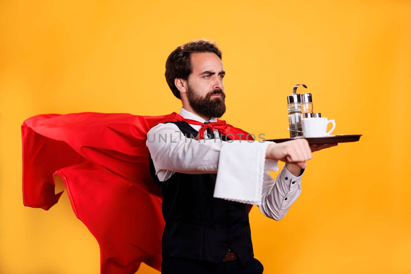 Elegant waiter with cape carrying coffee by DCStudio