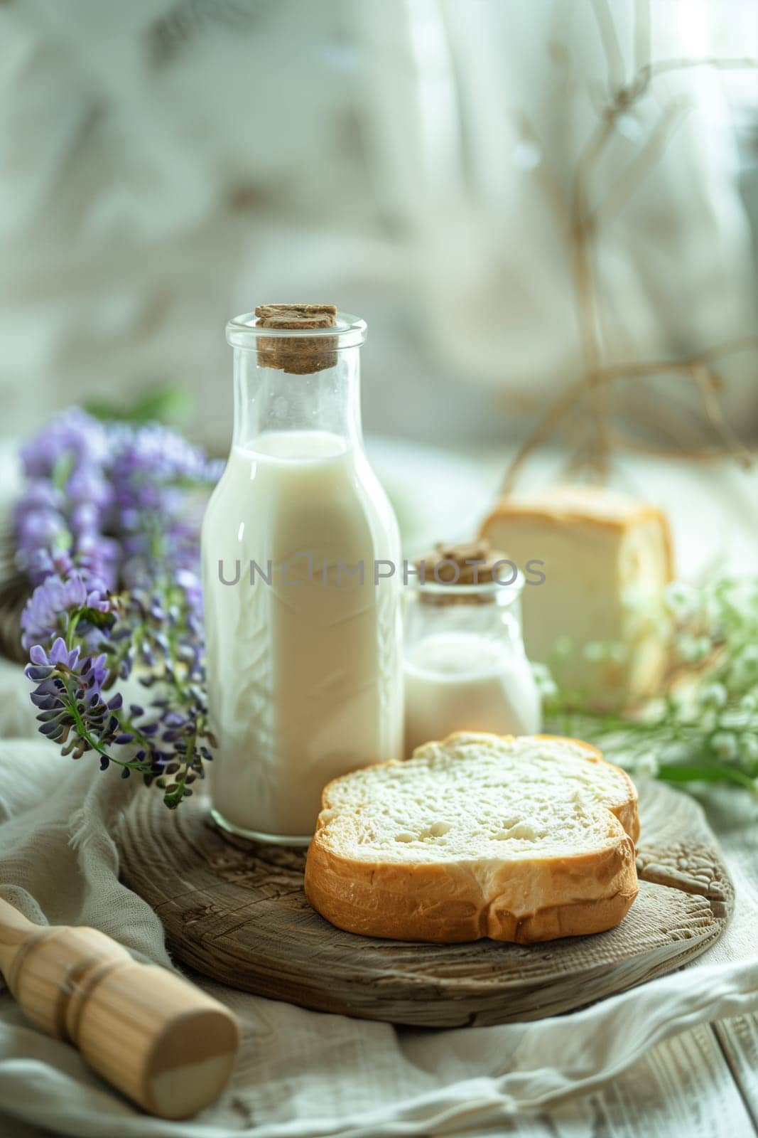 A table displaying bread and milk as part of a Shavuot celebration.