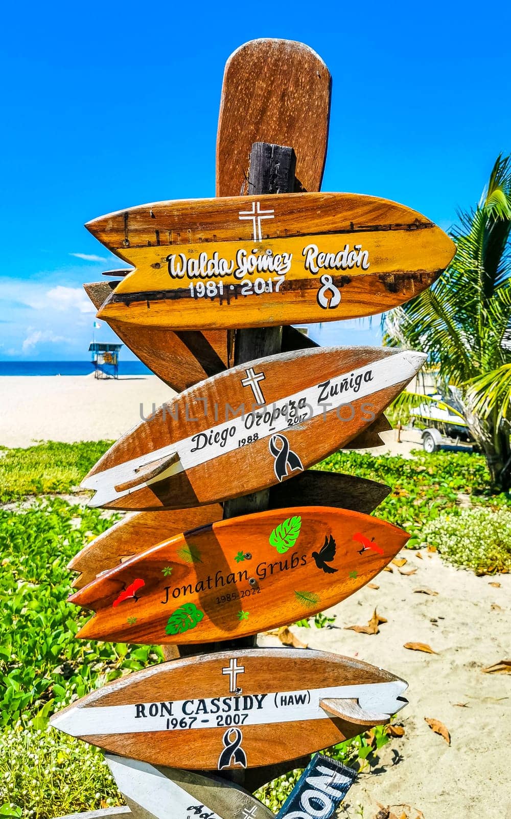 Advertising sign on surfboard surf board in Puerto Escondido Mexico. by Arkadij