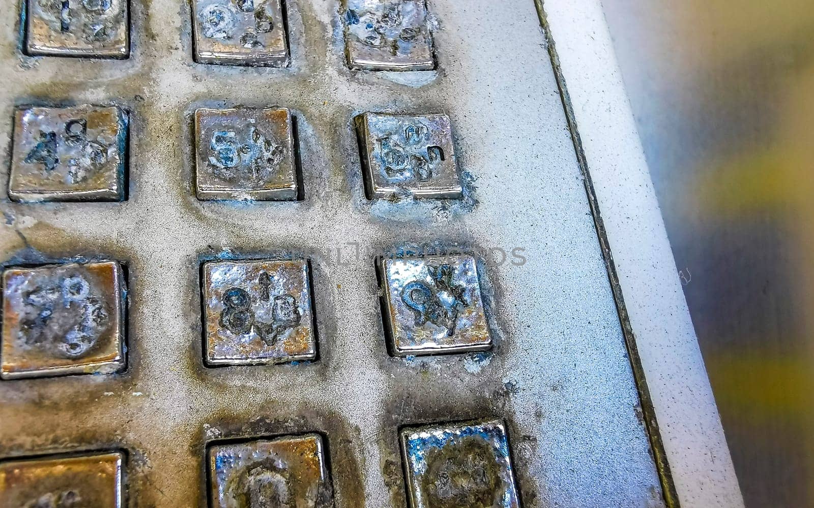 Old telephone box with handset and keypad in Zicatela Puerto Escondido Oaxaca Mexico.