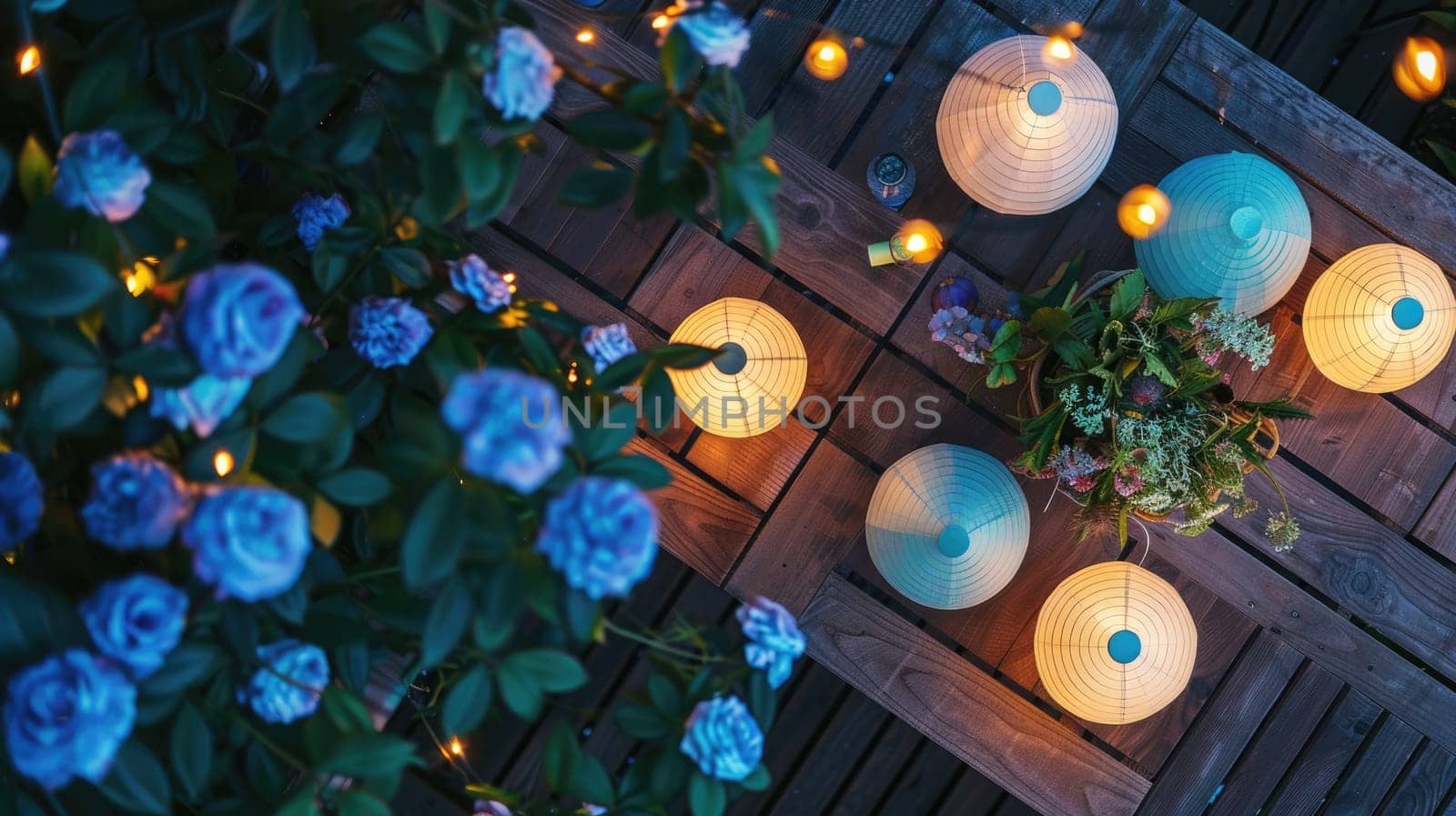 A wooden table adorned with candles, flowers, and an orange houseplant in a beautiful circular pattern, creating a cozy atmosphere for any event AIG50