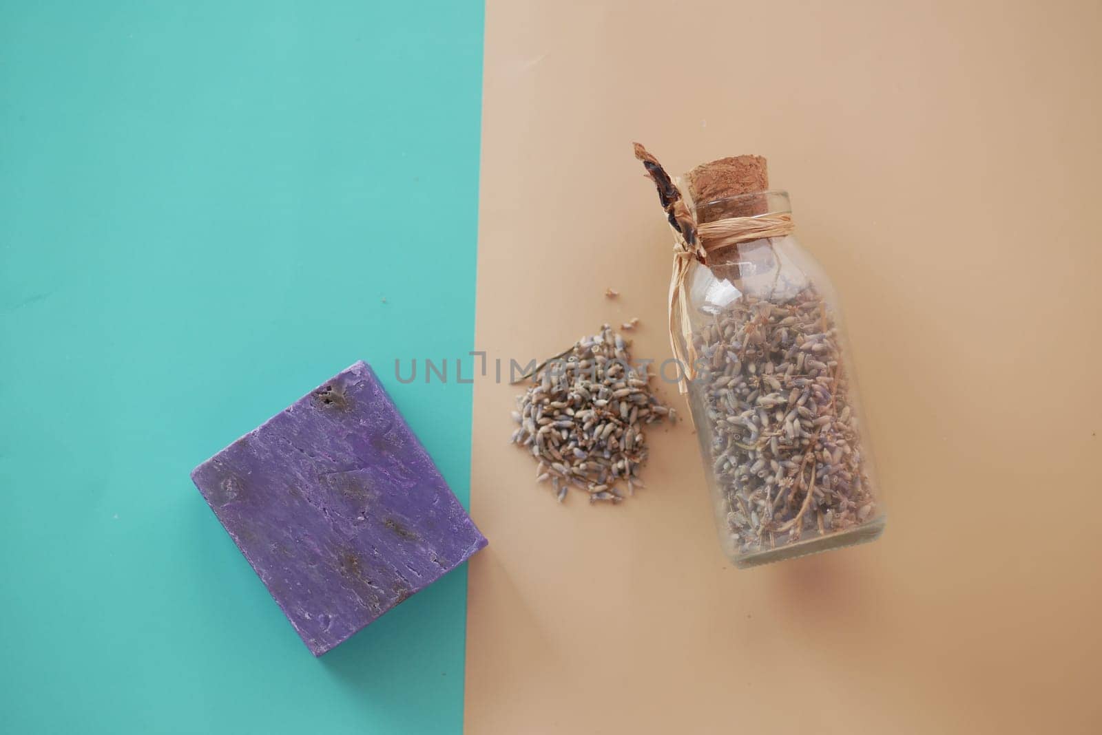 Homemade natural soap bar and lavender flower on table ,
