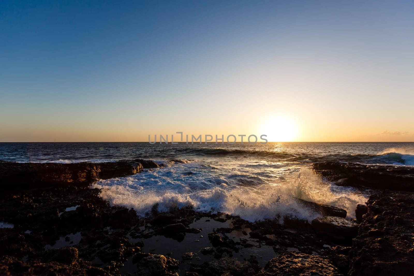 quiet sea coast with stones at the twilight, natural sea background