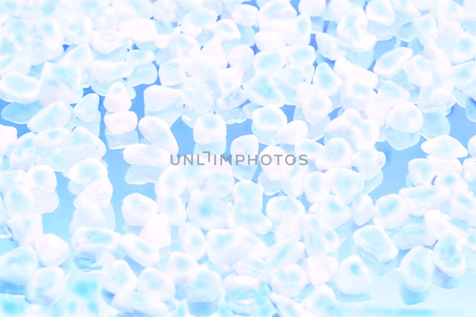 Transparent white stones on blue.Molecular cold temperature by jovani68