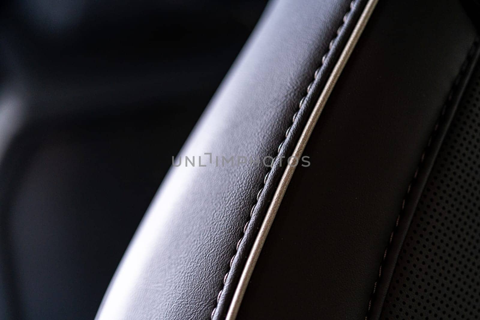 Detailed Close-up of the Leather Seat Stitching in Tesla Cybertruck by arinahabich