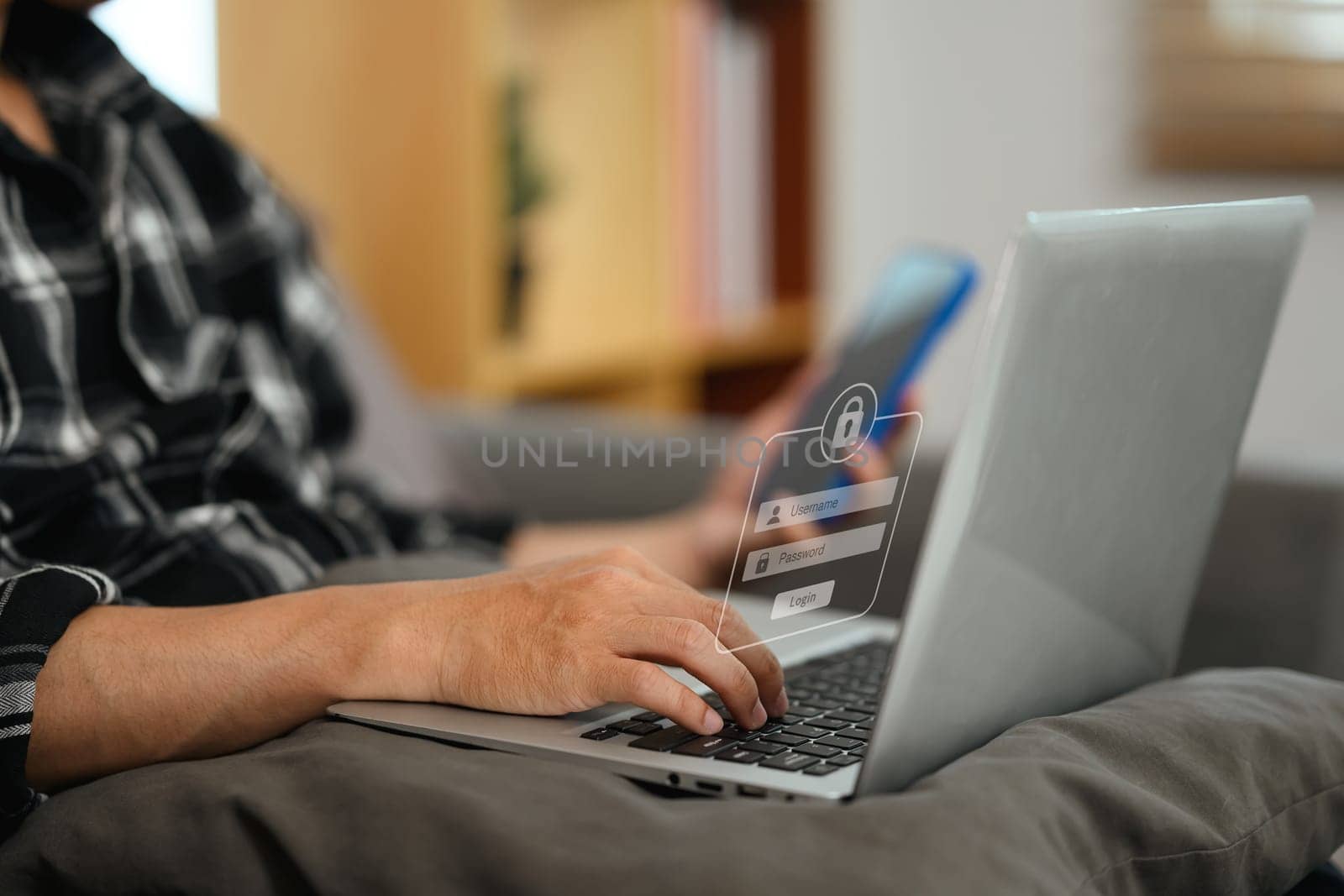 Man hands typing username and password on laptop for technology security.