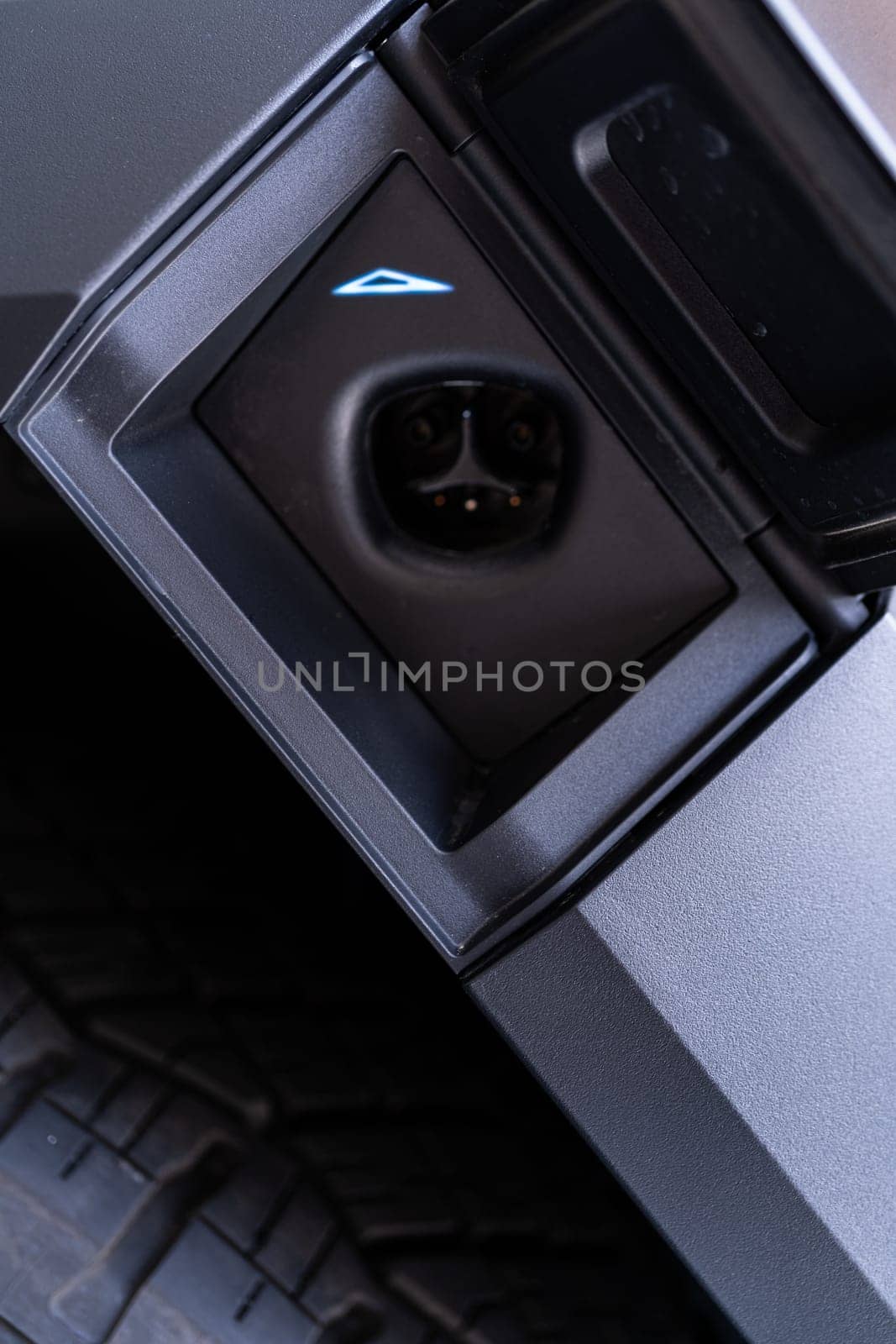 Close-Up of the Charging Port on a Tesla Cybertruck by arinahabich