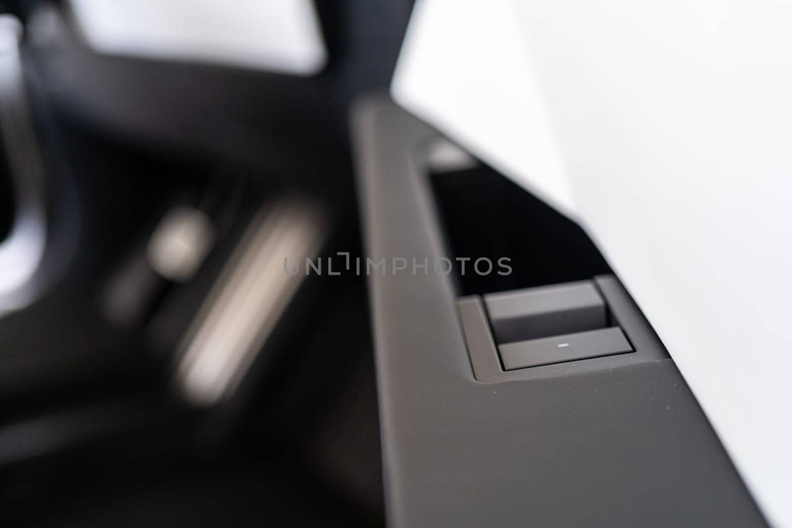 Close-Up of the Door Opener in a Tesla Cybertruck by arinahabich