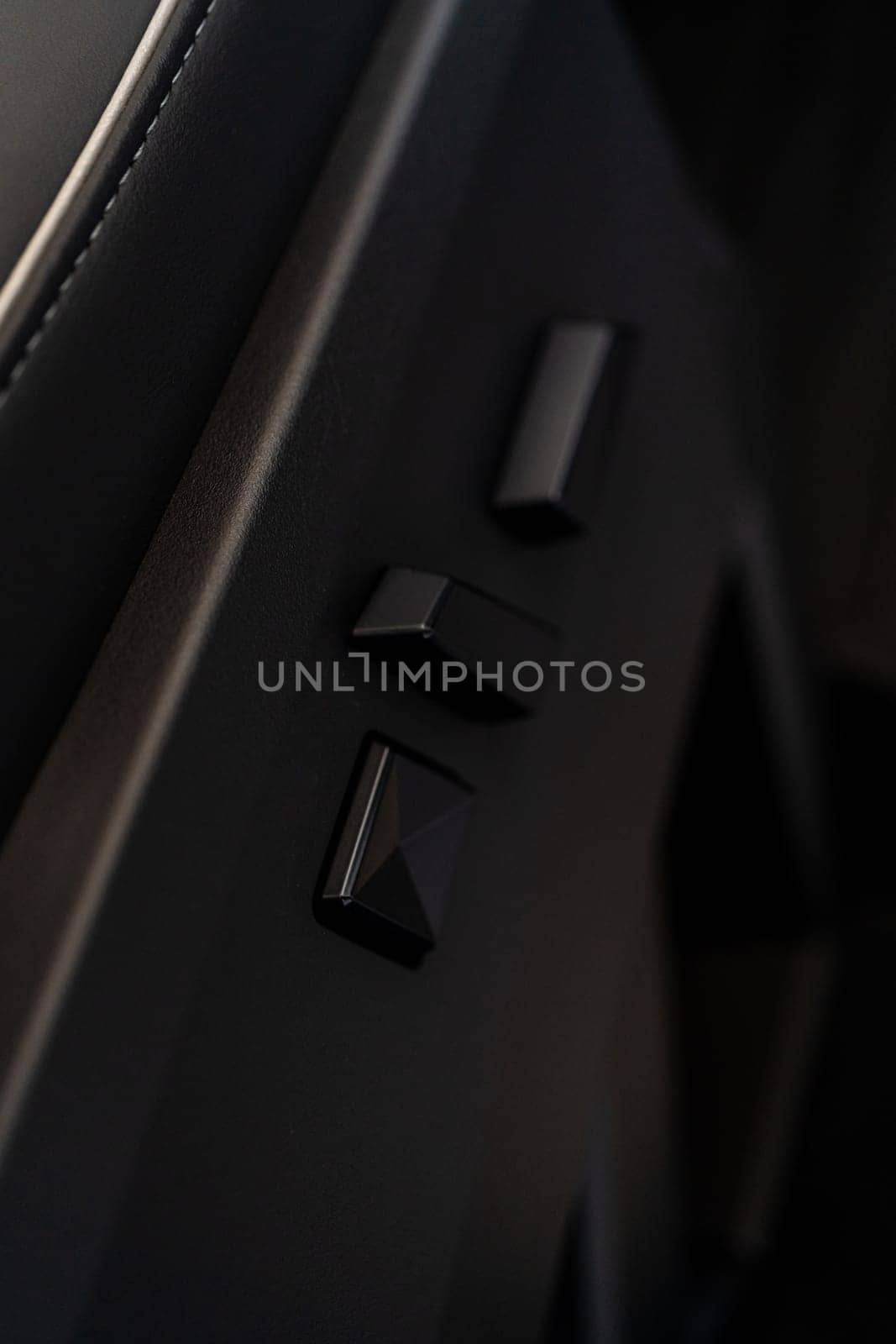 Close-up View of Seat Adjustment Buttons in Tesla Cybertruck by arinahabich