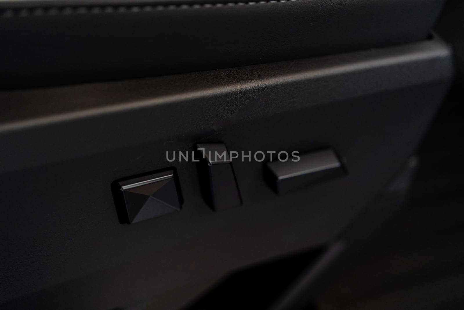 Close-up View of Seat Adjustment Buttons in Tesla Cybertruck by arinahabich