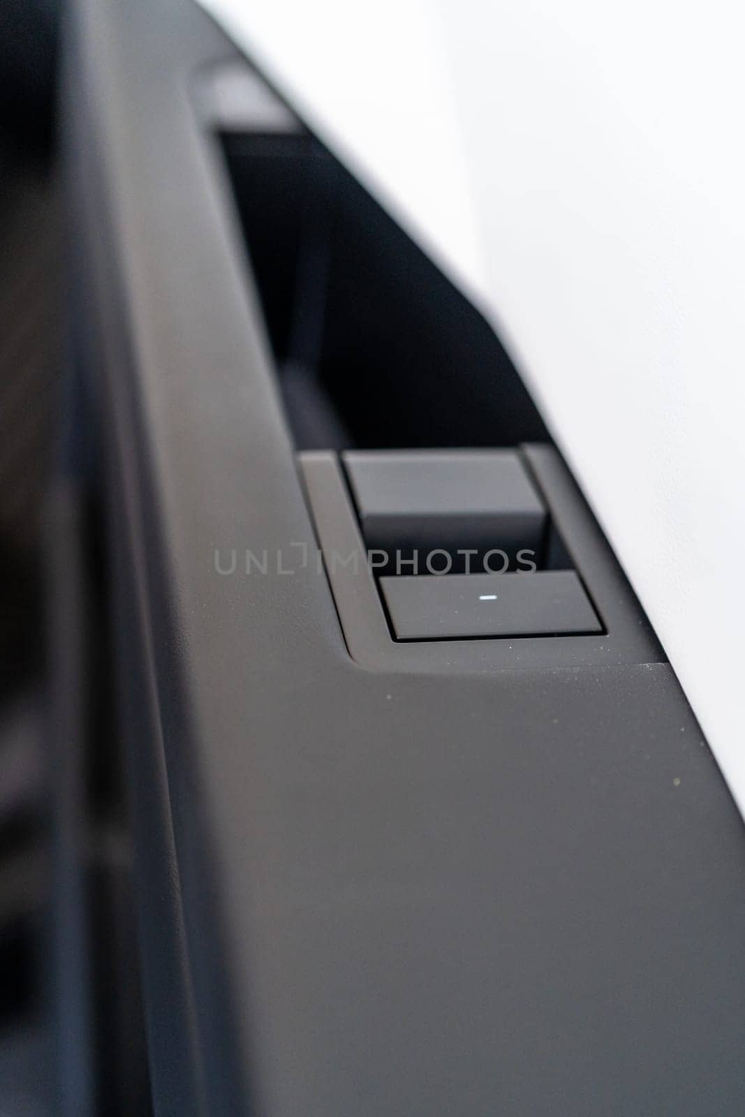 Close-Up of the Door Opener in a Tesla Cybertruck by arinahabich