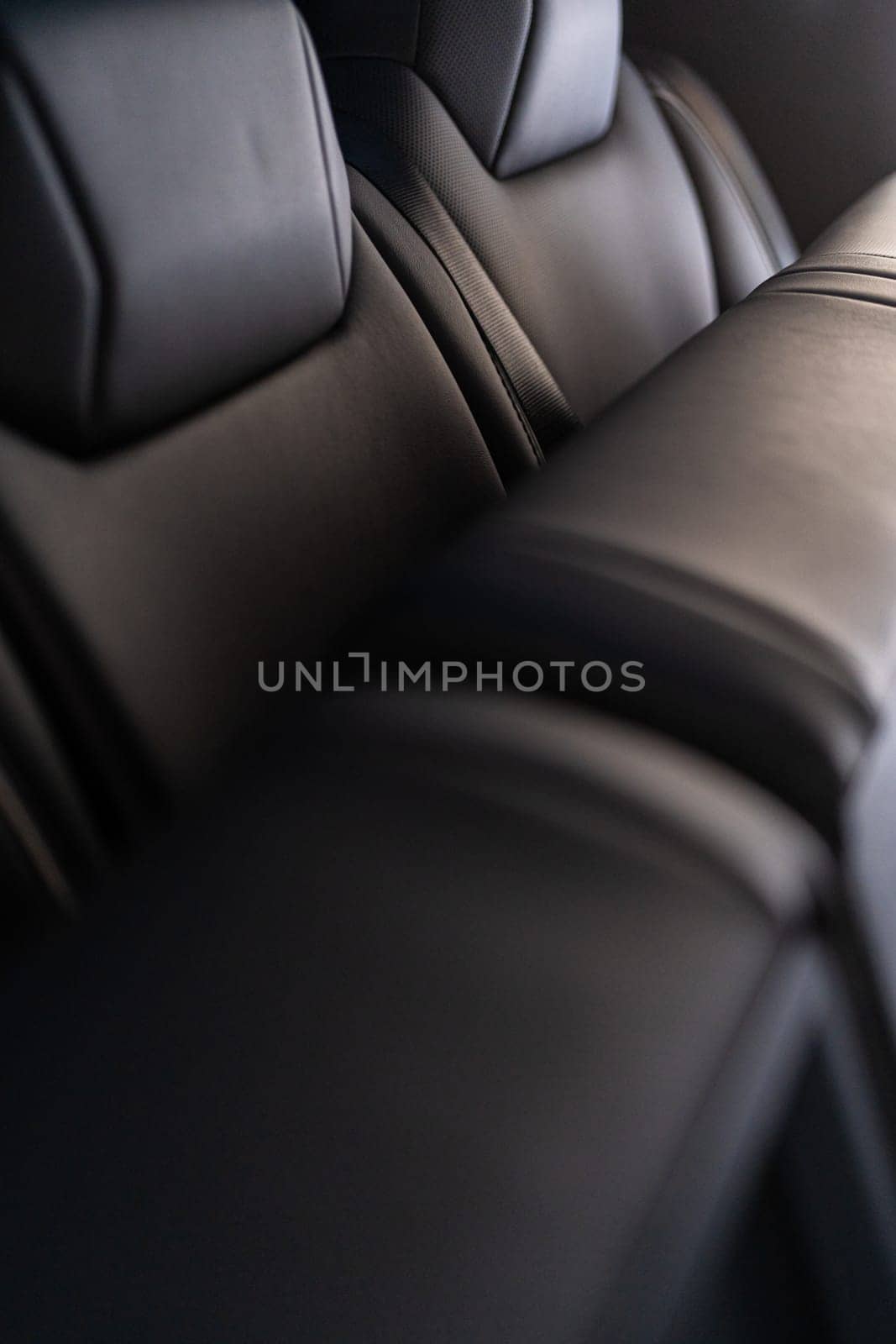 Denver, Colorado, USA-May 5, 2024-This image showcases a close-up view of the back seats in a Tesla Cybertruck, highlighting the sleek leather design and meticulous craftsmanship that characterize Tesla innovative approach to vehicle interiors.