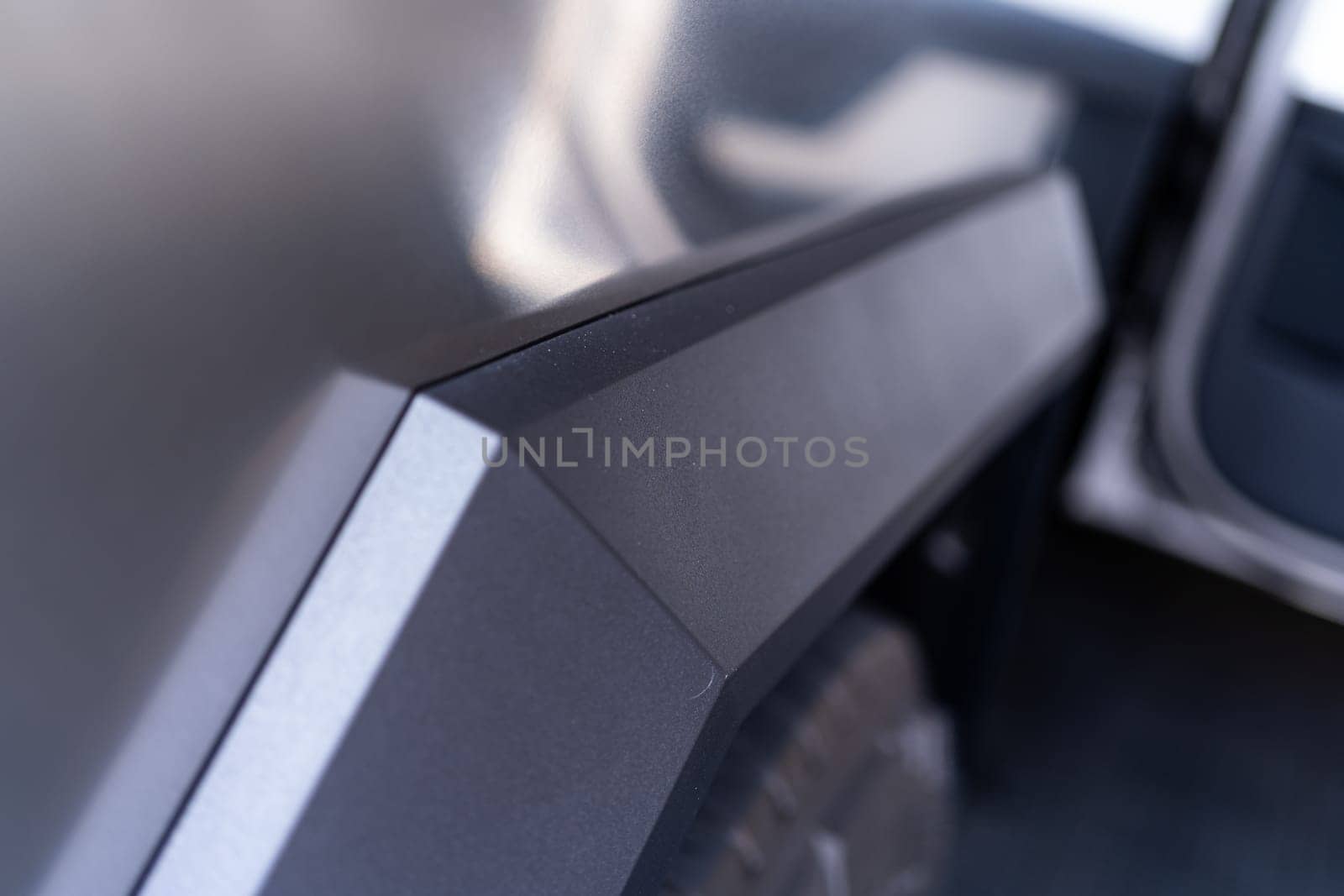 Close-Up View of Tesla Cybertruck Exterior Detail by arinahabich