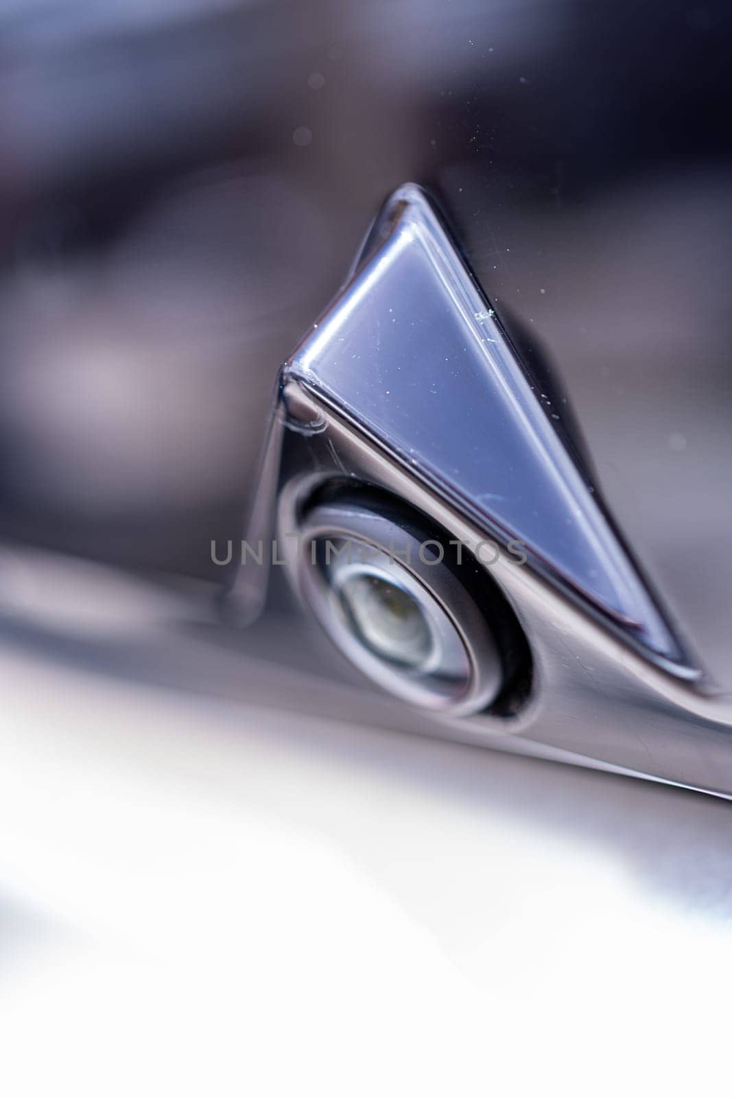 Denver, Colorado, USA-May 5, 2024-This image features a close-up view of the rear camera on a Tesla Cybertruck, highlighting the sleek, triangular design and the integration into the vehicle exterior.