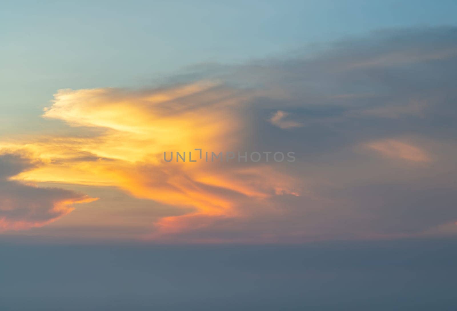 Evening sky scene with light from the setting sun, Last light of the day, The Stunning Beauty of a Sunset. by tosirikul