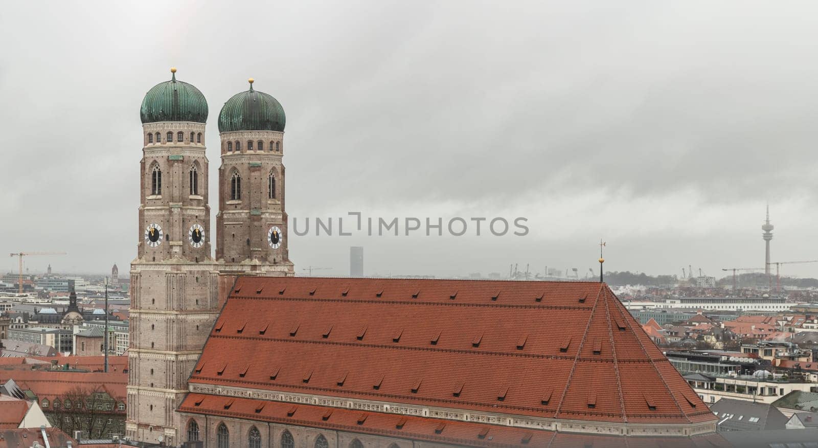 Munich, Germany - Dec 22, 2023 - Aerial view of Frauenkirche or Cathedral of Our Dear Lady is a catholic church in Munich, Bavaria in Germany. Space for text, Selective focus.