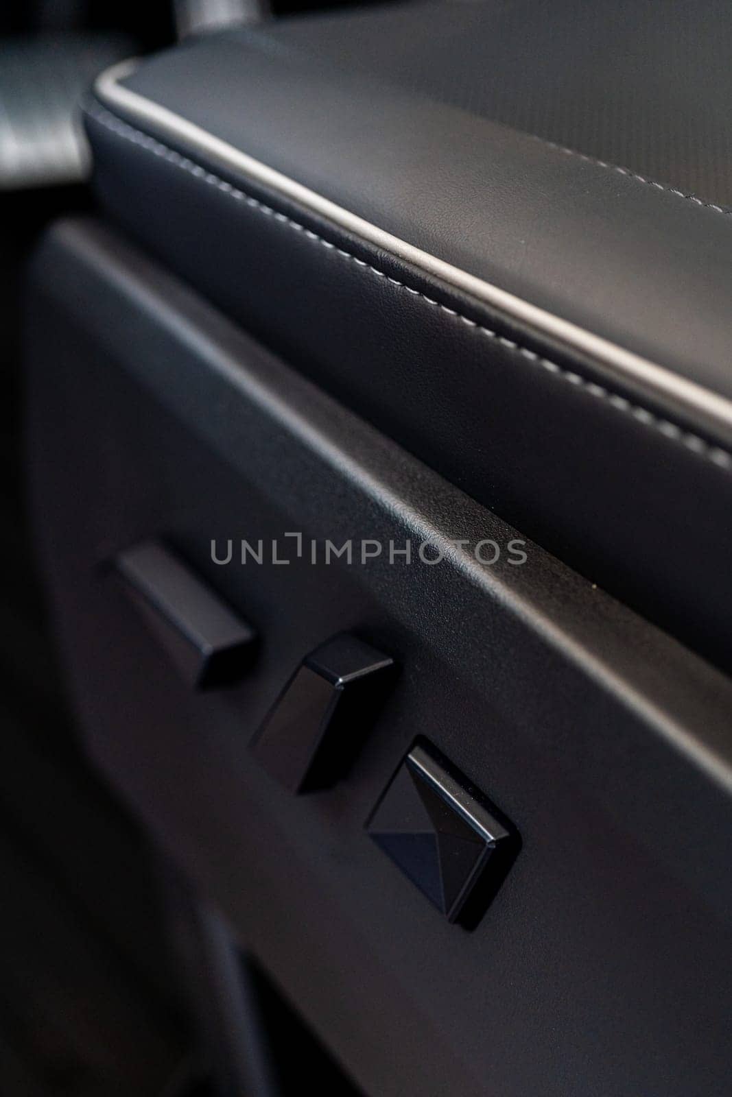 Close-up View of Seat Adjustment Buttons in Tesla Cybertruck by arinahabich