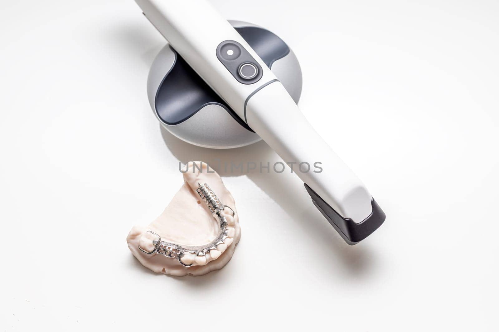 Isolated 3D Intraoral Teeth Scanner For Imaging Tooth and Metal Frame Lower Partial Denture, Cobalt Chrome Dental Plate, Bridge Printed By 3d Printer. Dental Equipment, Device, Dentistry. Horizontal