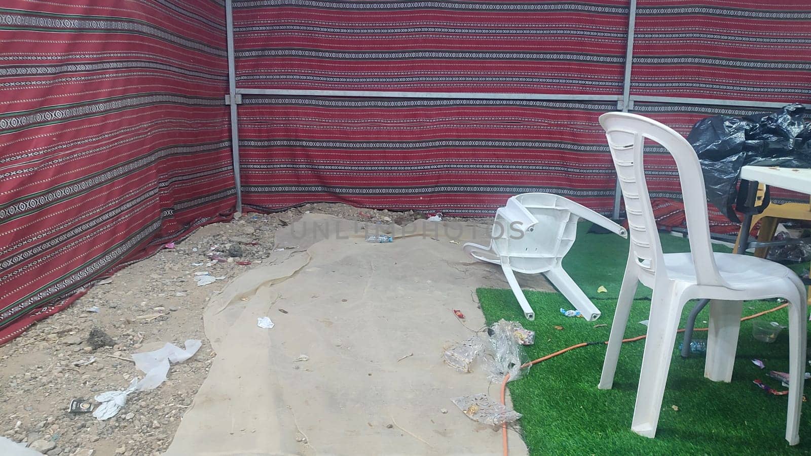 Bedouin Arab tent, white plastic chairs, Israel. High quality photo