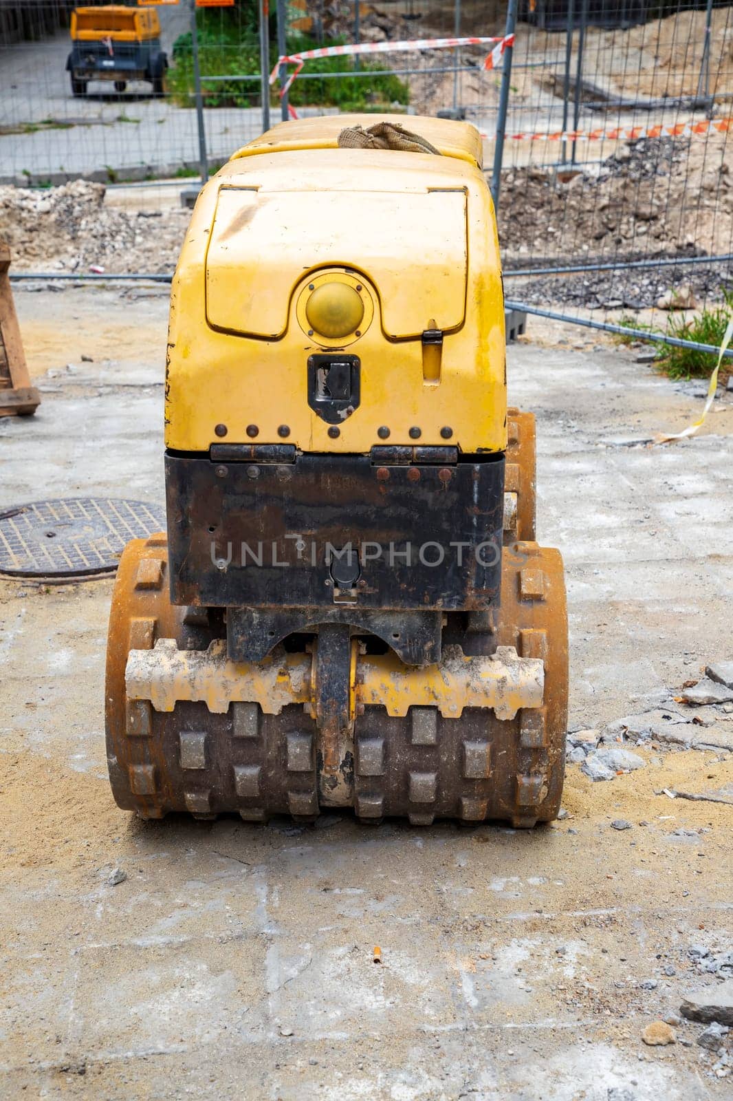 Small Trench roller with remote control at the construction site 