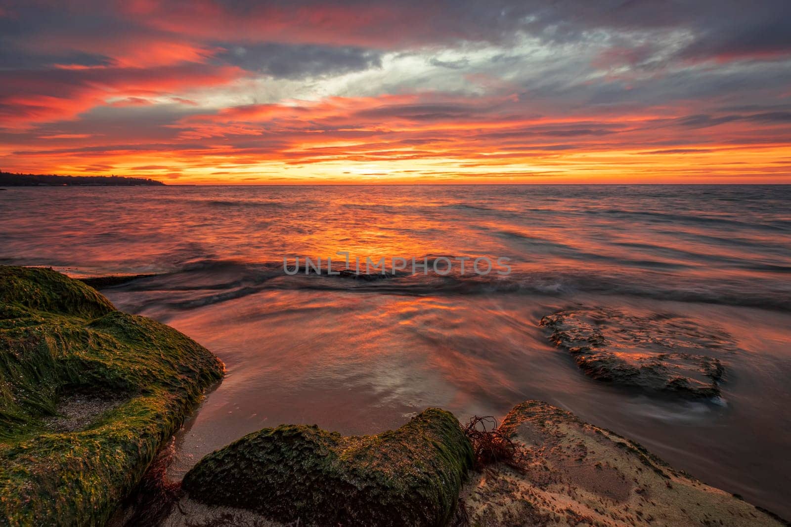Amazing red sunrise over the sea.	 by EdVal
