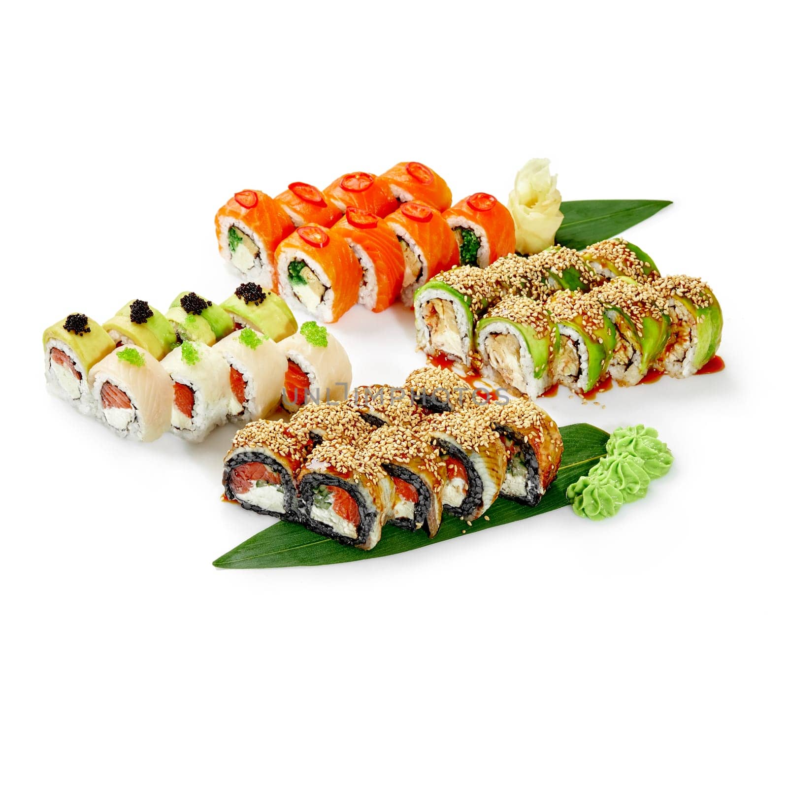 Сolorful assortment of Japanese sushi rolls on bamboo leaves by nazarovsergey