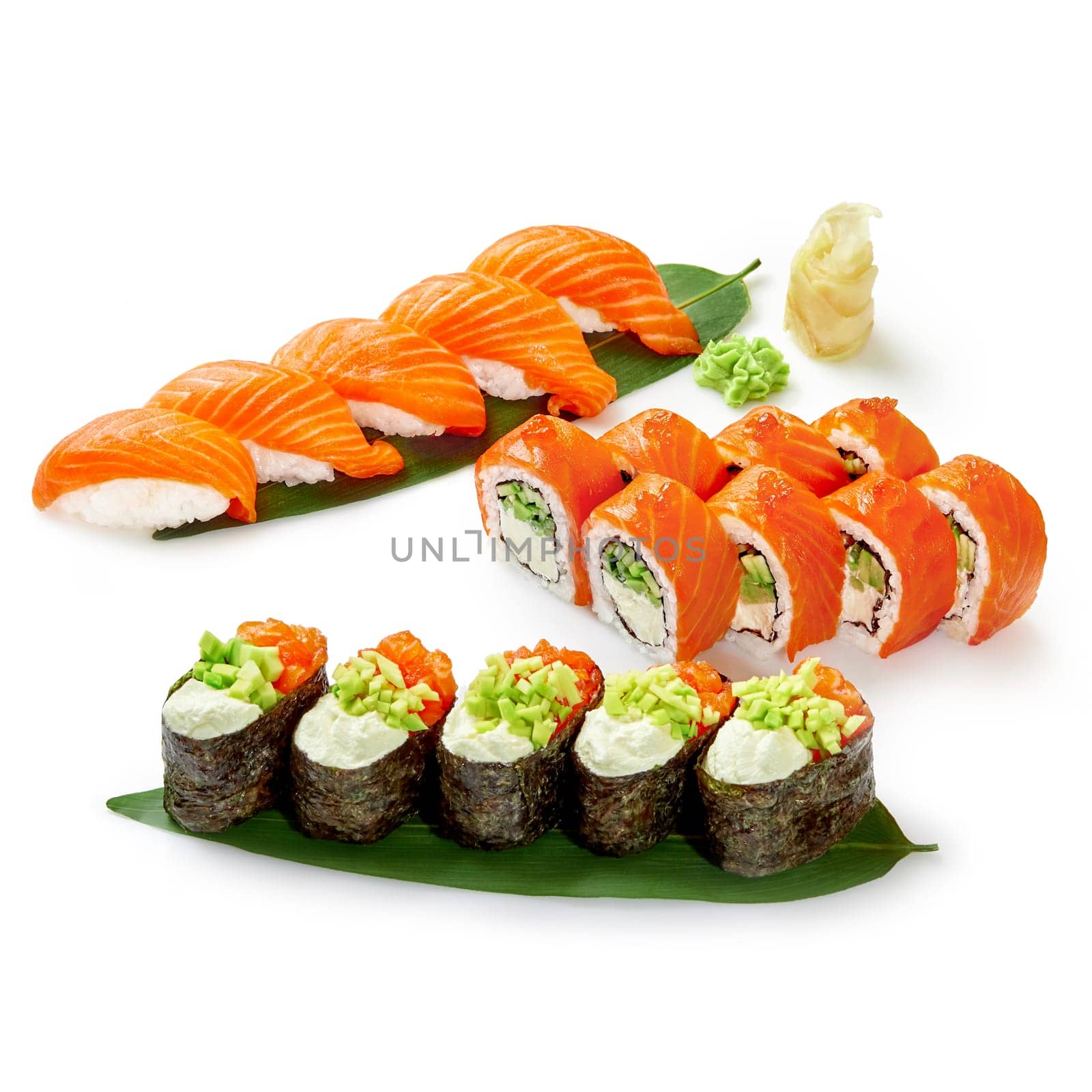Enticing salmon sushi set featuring nigiri, gunkan, and rolls with delicate toppings and fillings of fresh salmon, elegantly displayed on bamboo leaf with wasabi and pickled ginger