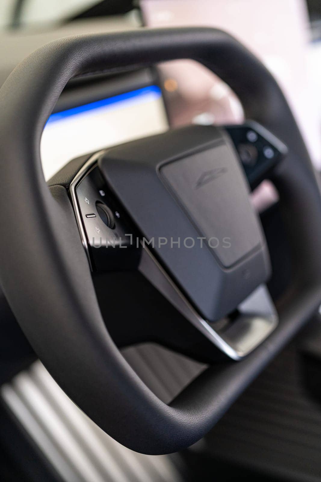 Close-Up View of the Steering Wheel in a Tesla Cybertruck by arinahabich