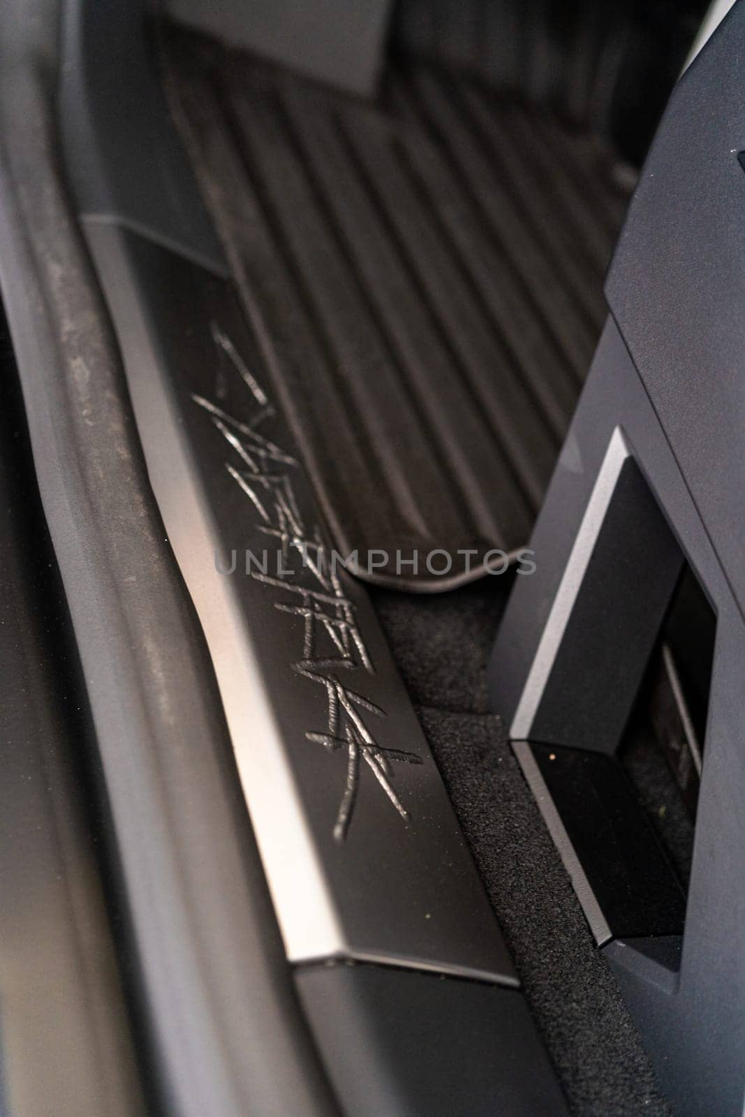 Close-Up of Tesla Cybertruck Signature Metal Engraving by arinahabich