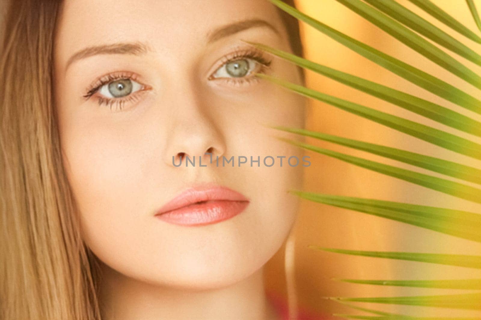 Summer beauty, makeup and skincare, face portrait of beautiful woman with tropical palm tree leaf, natural makeup for cosmetics and fashion look by Anneleven