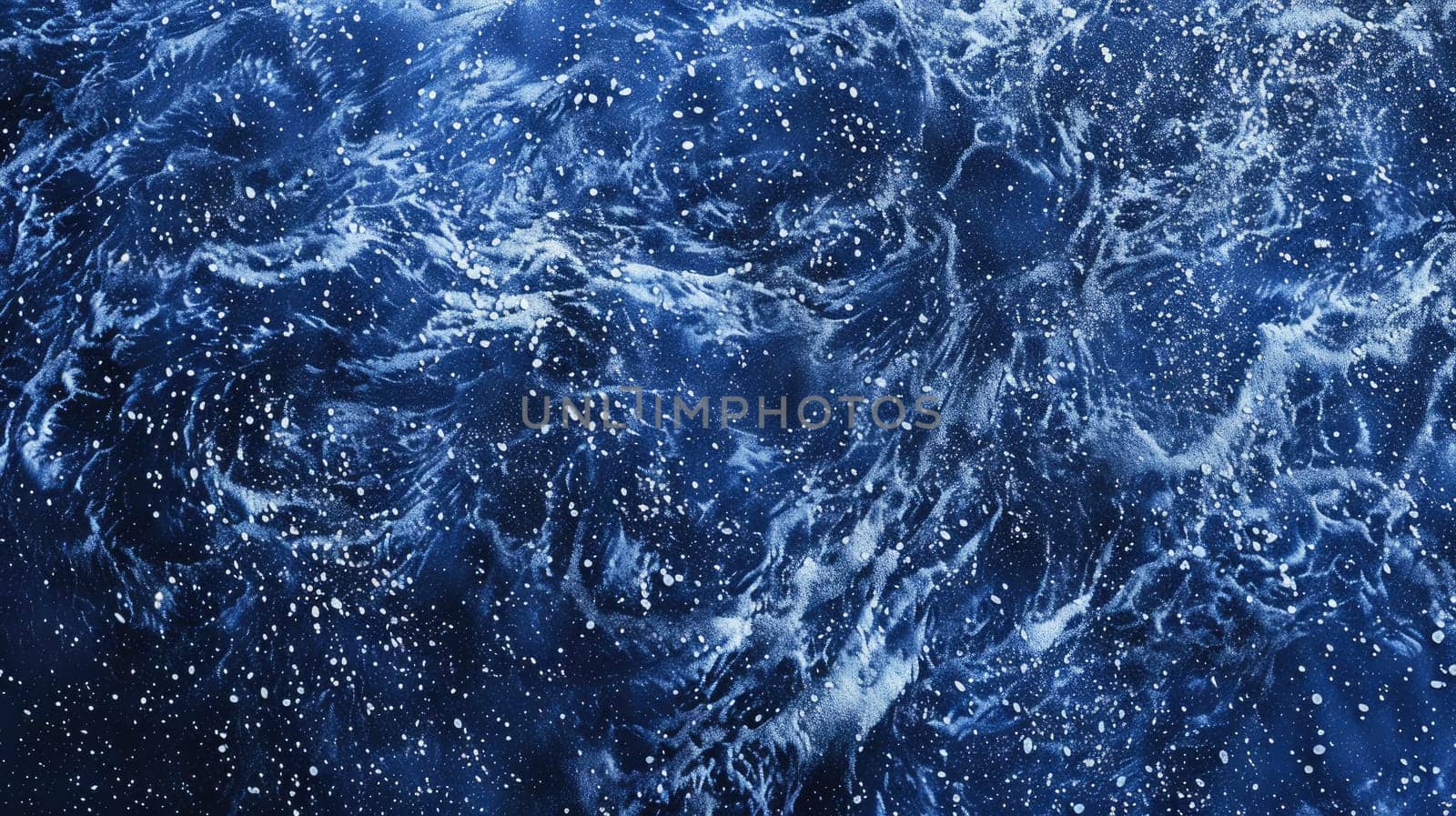 An electric blue sky filled with stars creates a mesmerizing pattern in the darkness of space. The event showcases the beauty of liquid precipitation through the lens of science AIG50