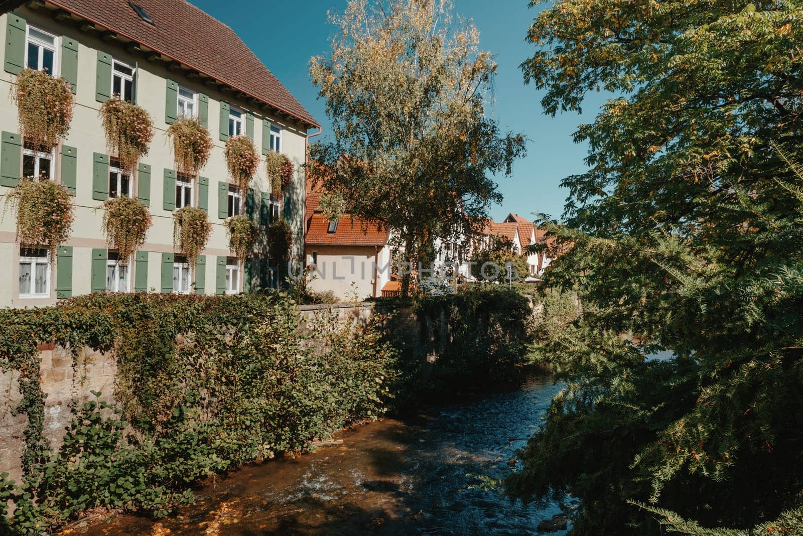 Old national German town house. Old Town is full of colorful and well preserved buildings. Baden-Wurttemberg is a state in southwest Germany bordering France and Switzerland. The Black Forest, known for its evergreen scenery and traditional villages, lies in the mountainous southwest. Stuttgart, the capital, is home to Wilhelma, a royal estate turned zoo and gardens. Porsche and Mercedes-Benz have headquarters and museums there. The 19th-century Hohenzollern Castle sits in the Swabian Alps to the south.