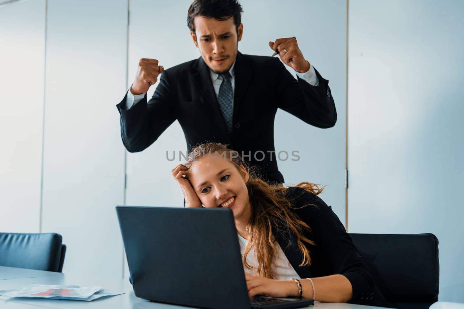Businessman boss feels angry and mad at bad misbehaving businesswoman employee who ignores the work tasks at the workplace. Firing workers and human resources management problem concept. uds