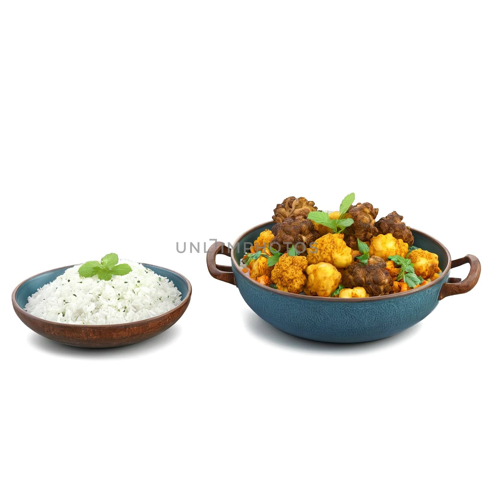 Aromatic curry bowl with tender lamb basmati rice roasted cauliflower and mint raita served in by panophotograph