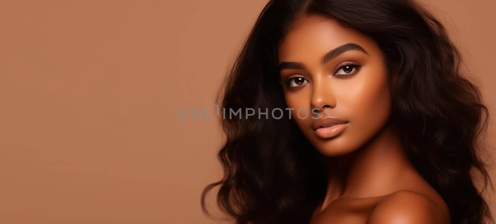 Beauty portrait of pretty young African woman with long hair, beautiful lovely model posing on brown studio background