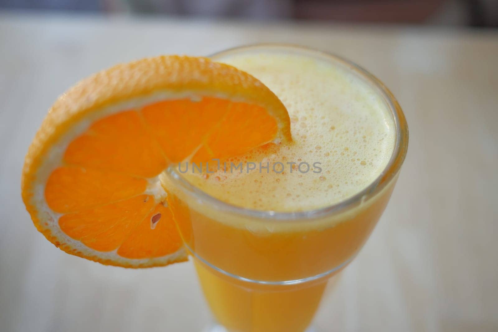 glass of orange juice outdoor ,