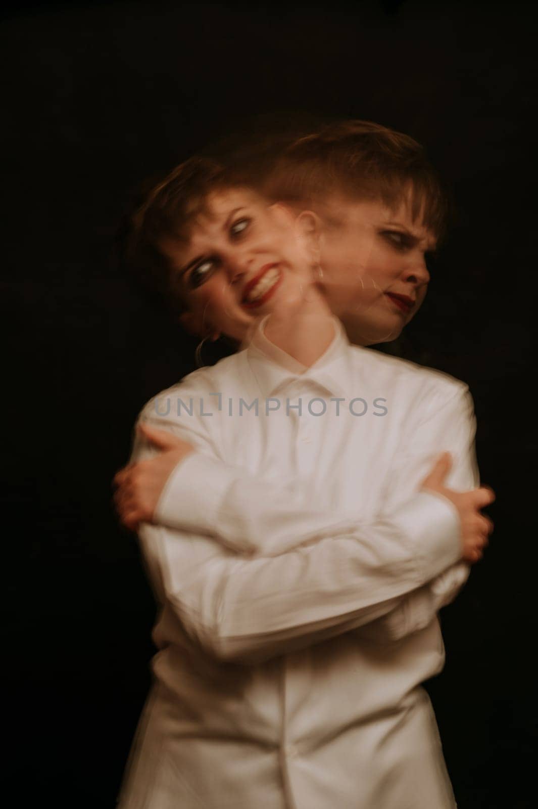 woman is a psychopath with schizophrenia and mental disorders. Portrait of a paranoid with anxiety on a dark background