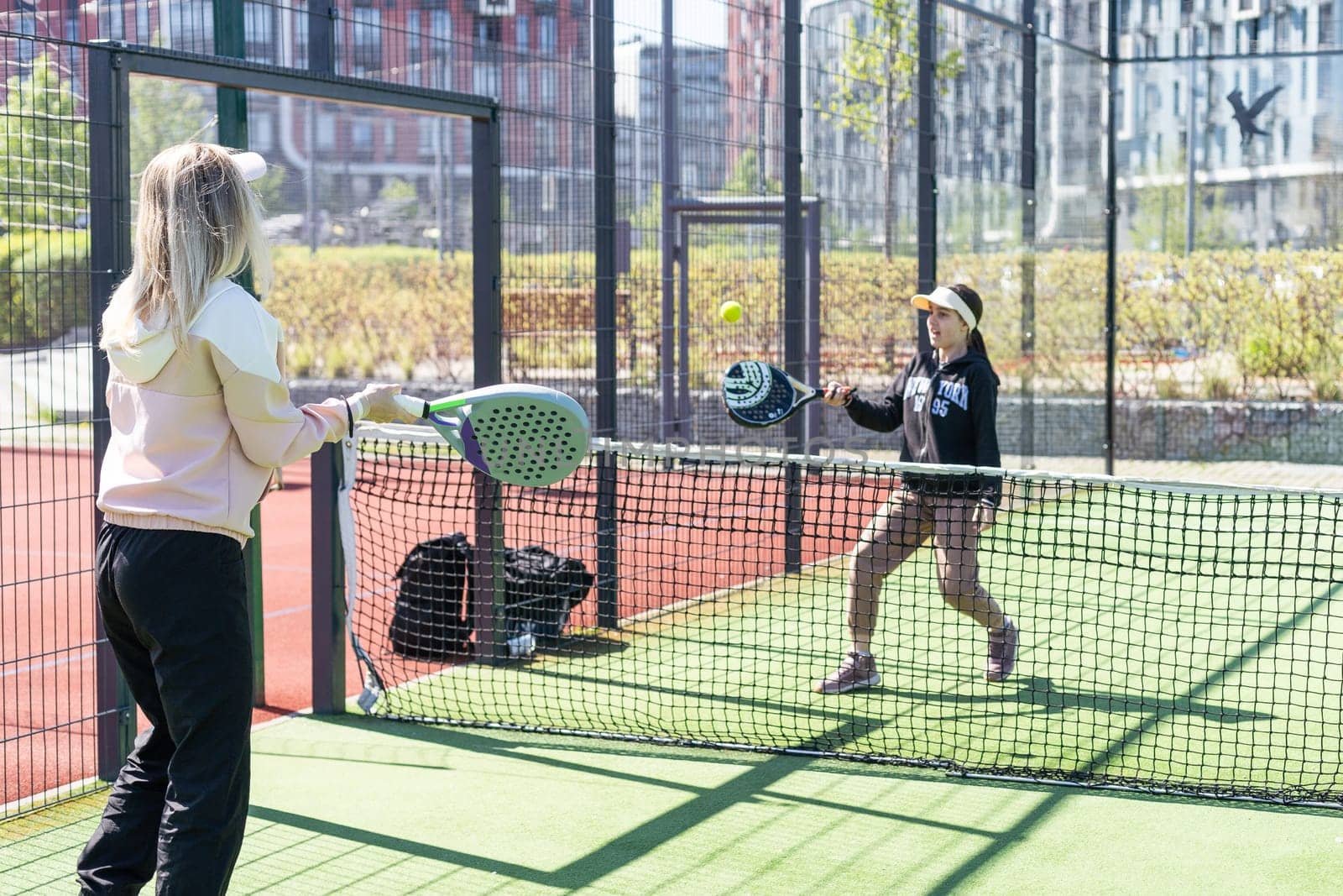 One women playing Paddle tennis. High quality photo