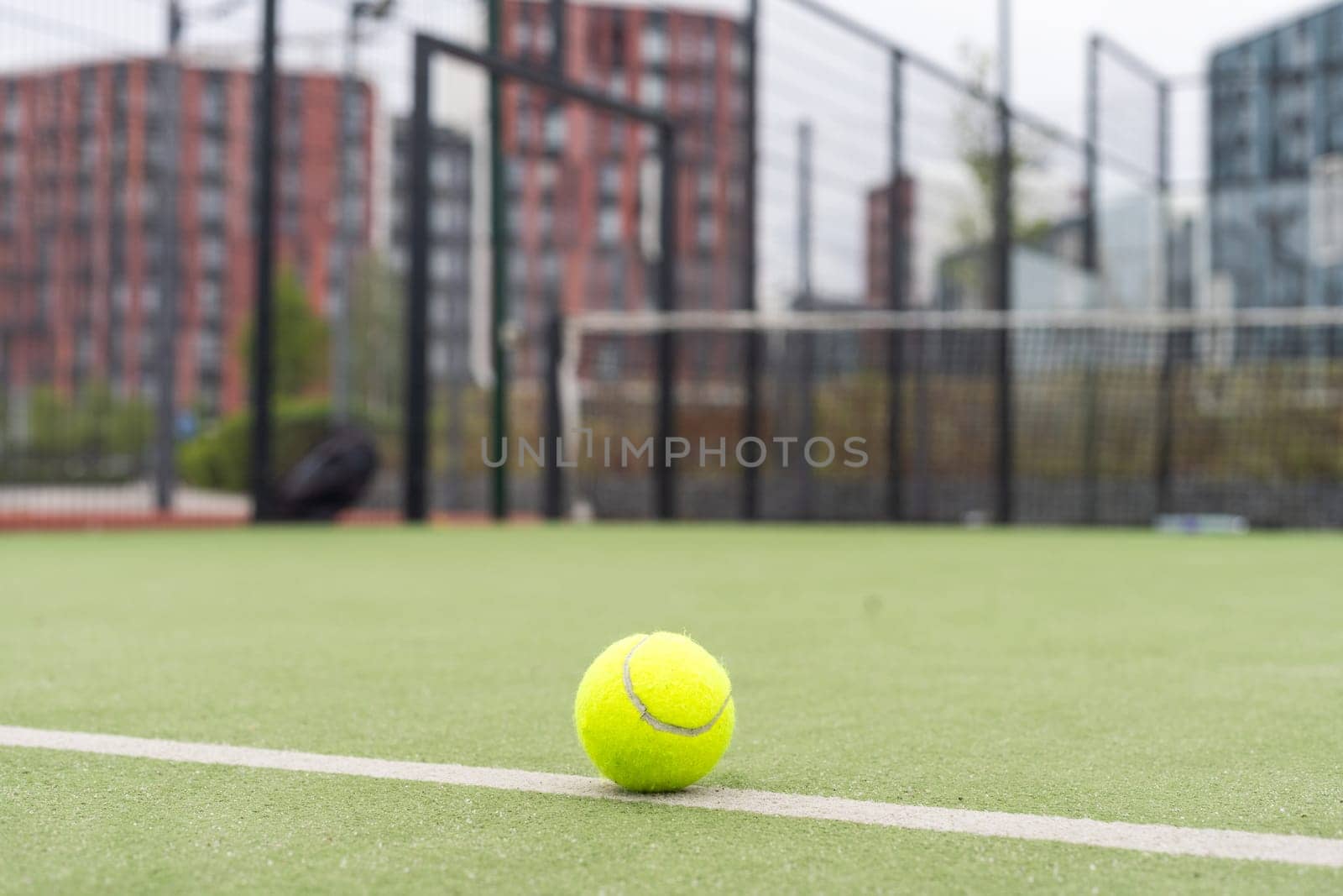 a picture of a tennis ball on the court. High quality photo