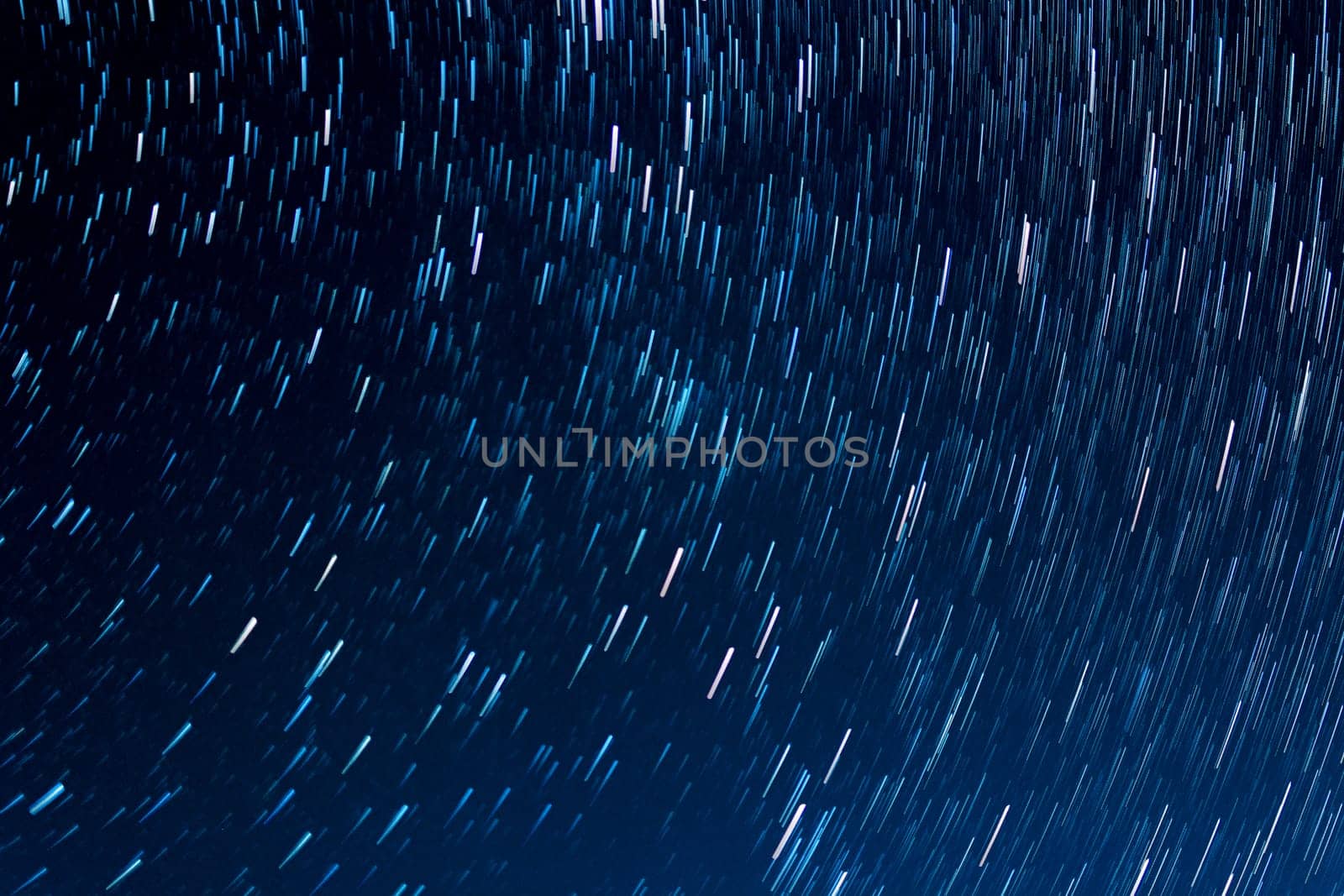 tracks from the stars against the dark night sky