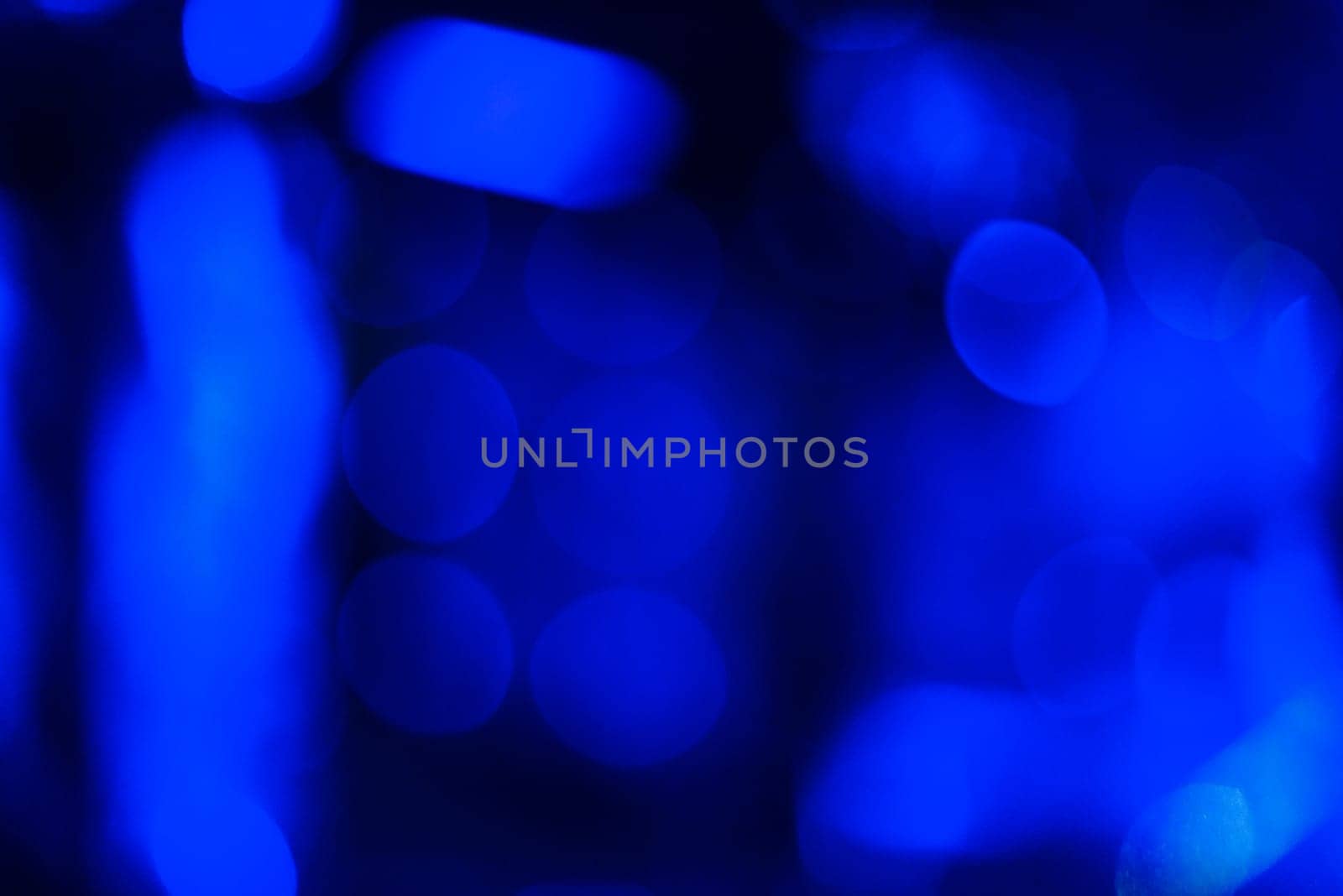 blue background with abstract blurred circular bokeh