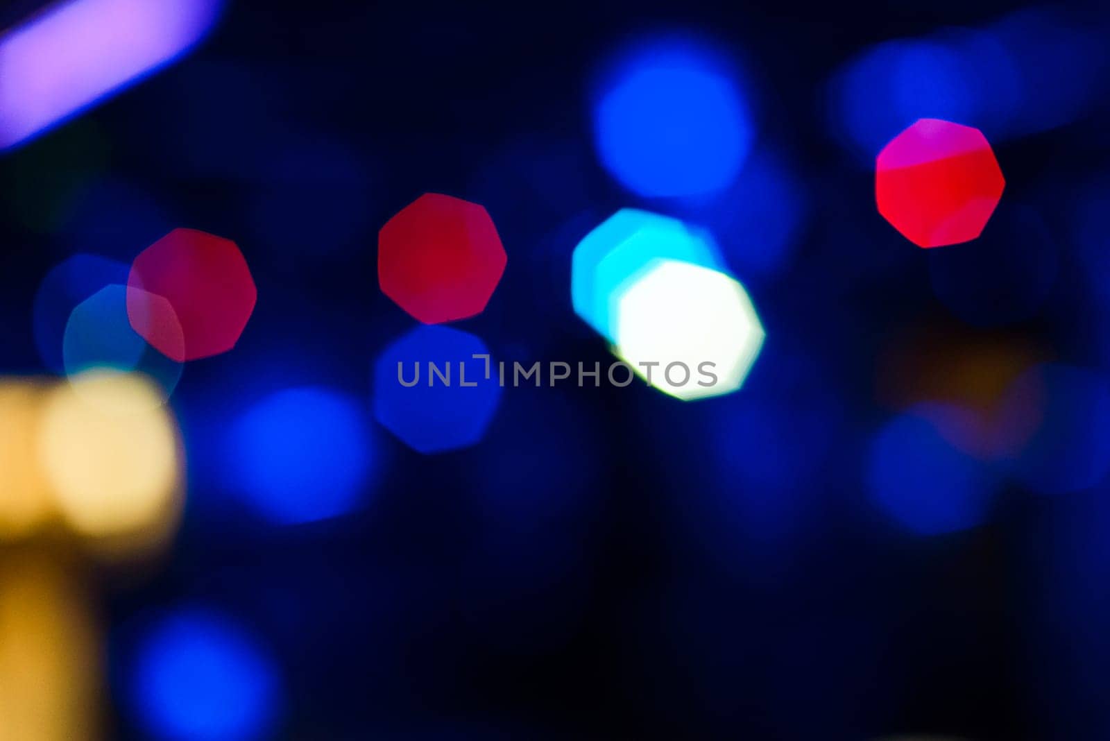 color blurred background with a red and blue glowing bokeh