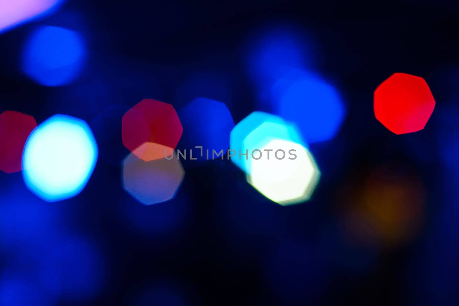 color blurred background with bright glowing festive bokeh