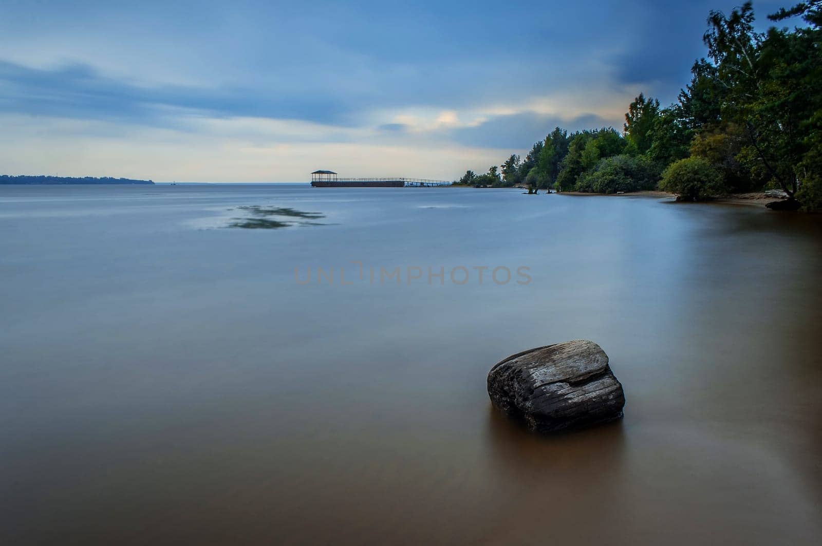 dramatic cloudy weather, the river at a slow shutter speed
