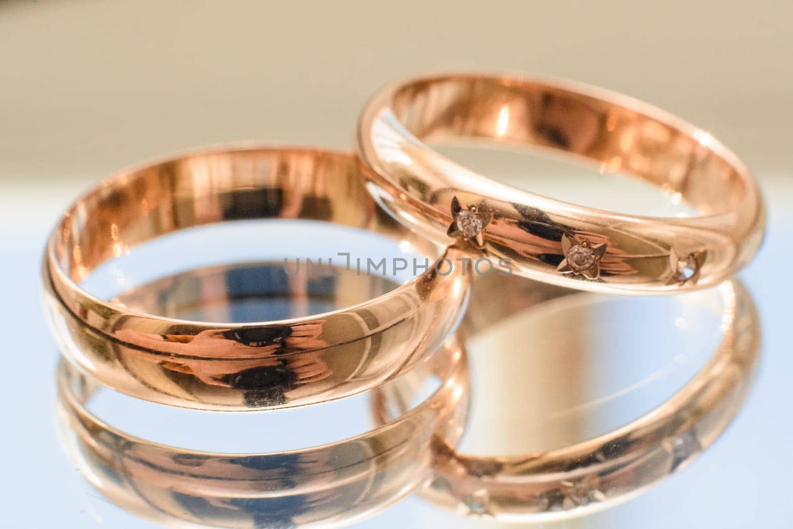 pair of gold wedding rings close-up for a wedding ceremony