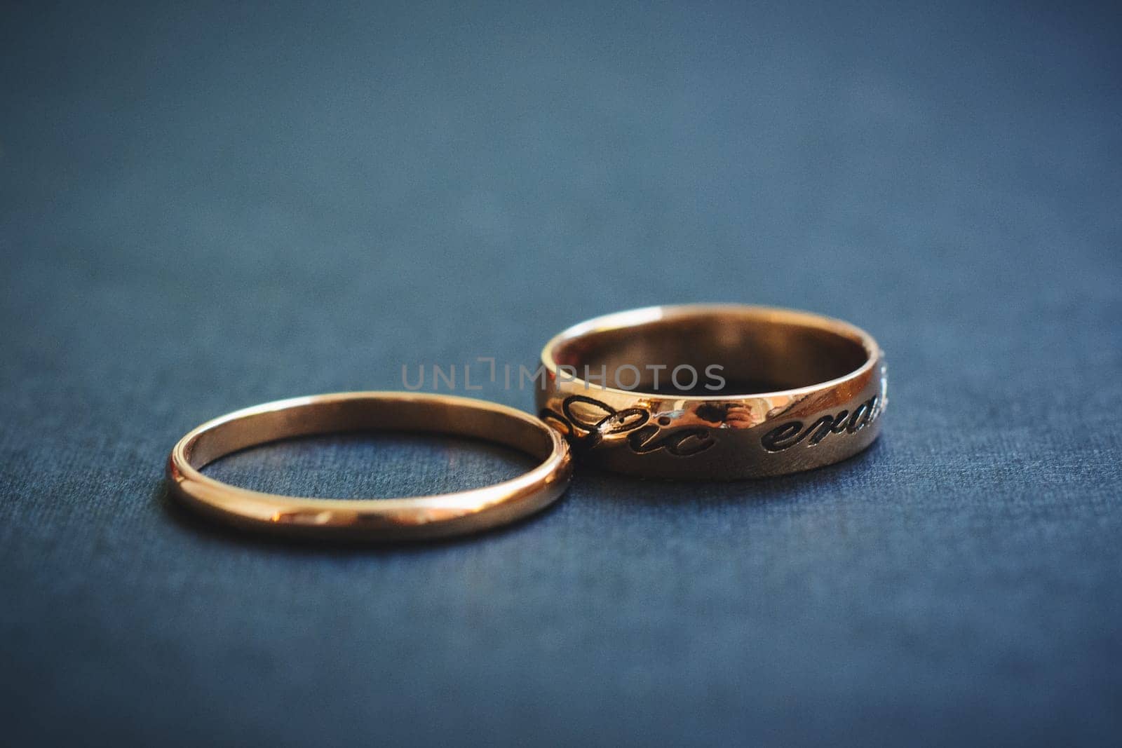 pair of gold wedding rings close-up for a wedding ceremony
