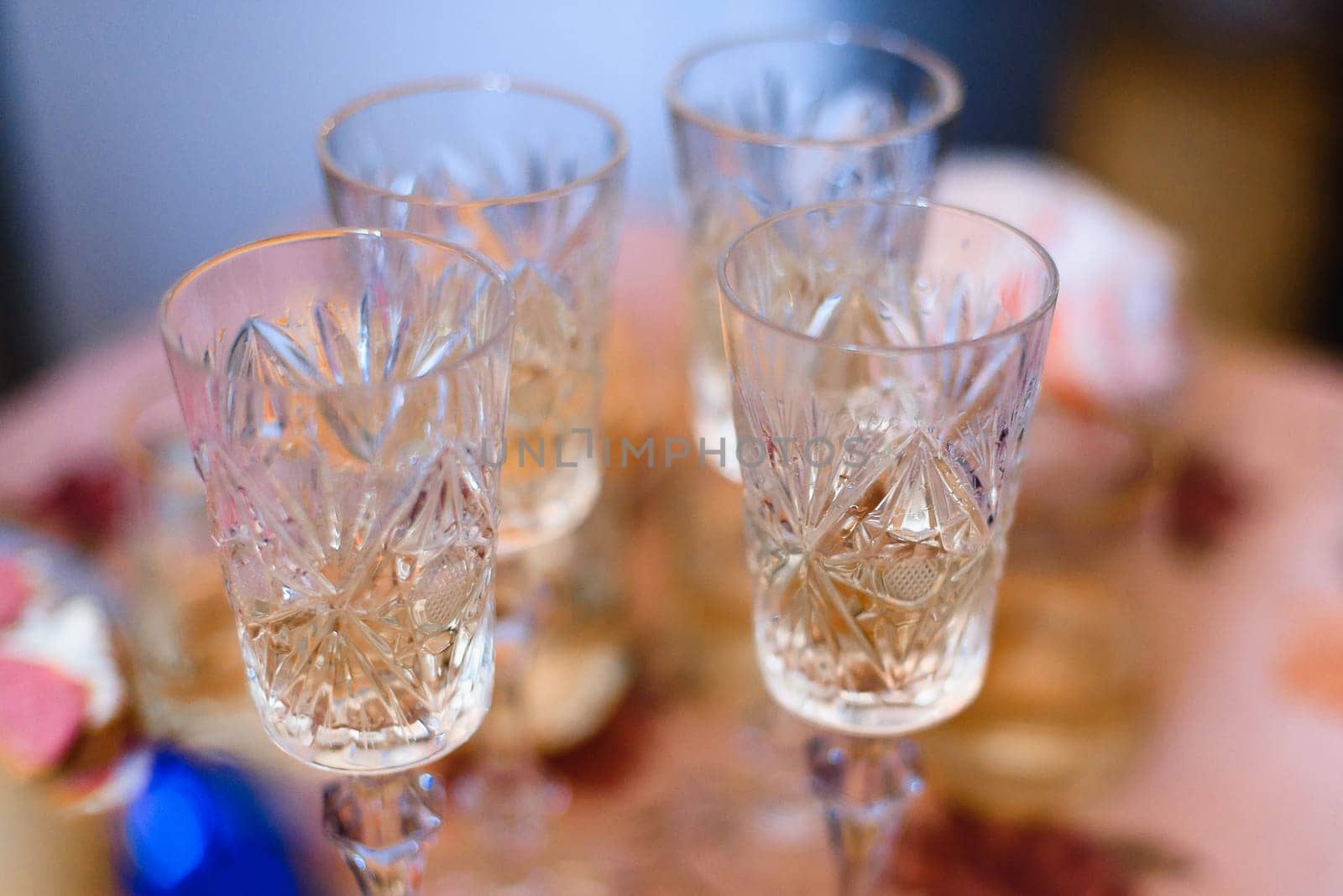 group of empty shot glasses for vodka in the pub are on the table