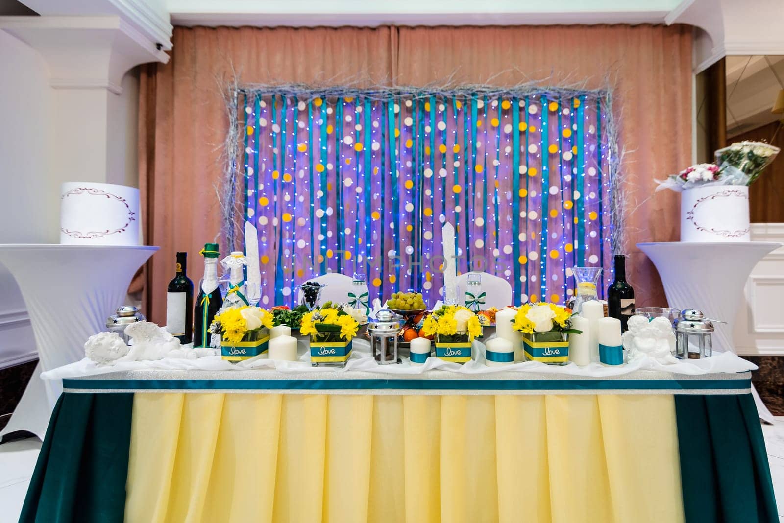 Bridal table for a romantic dinner in decorated restaurant