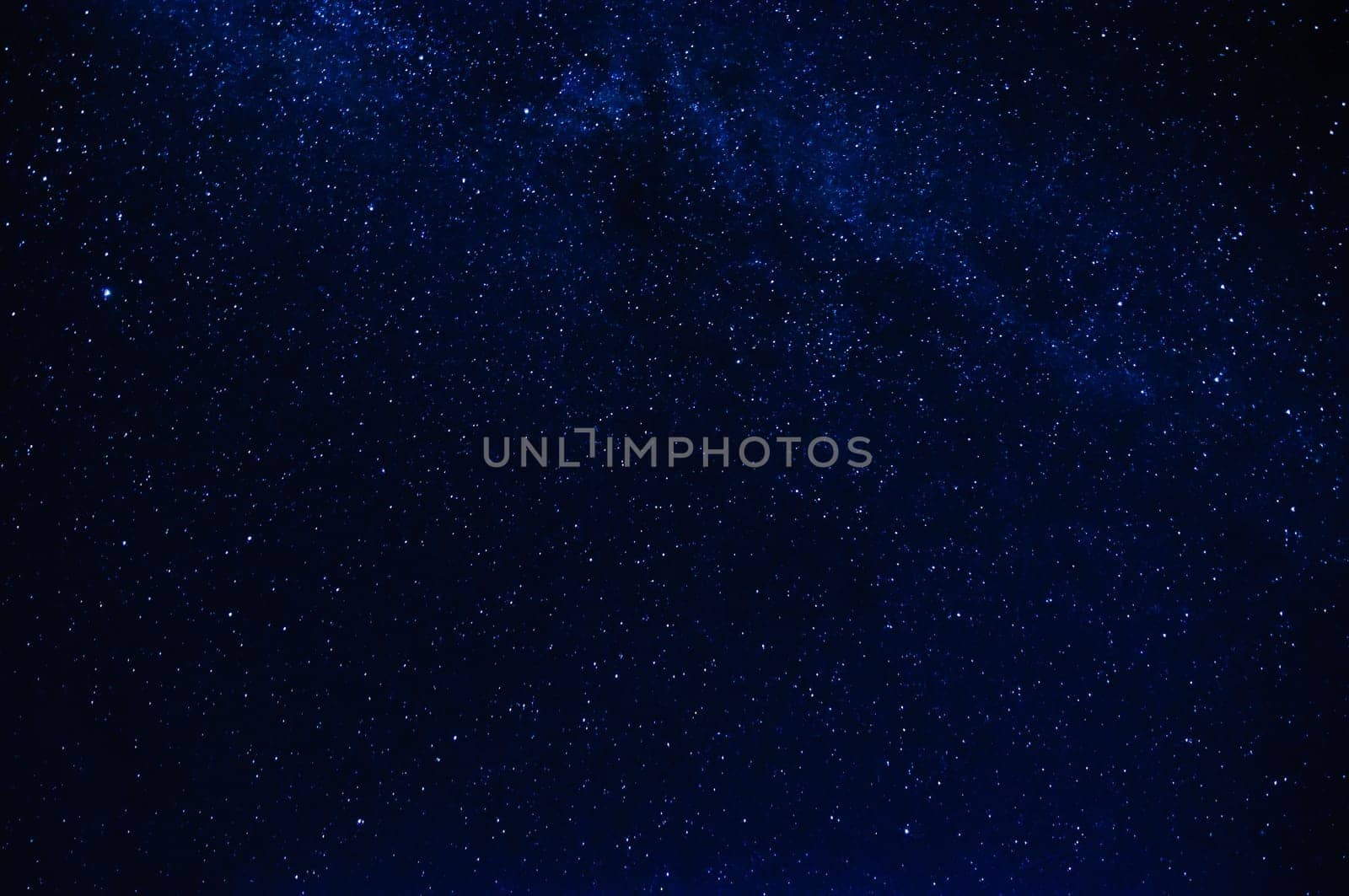 stars on the night dark blue starry sky with the milky way