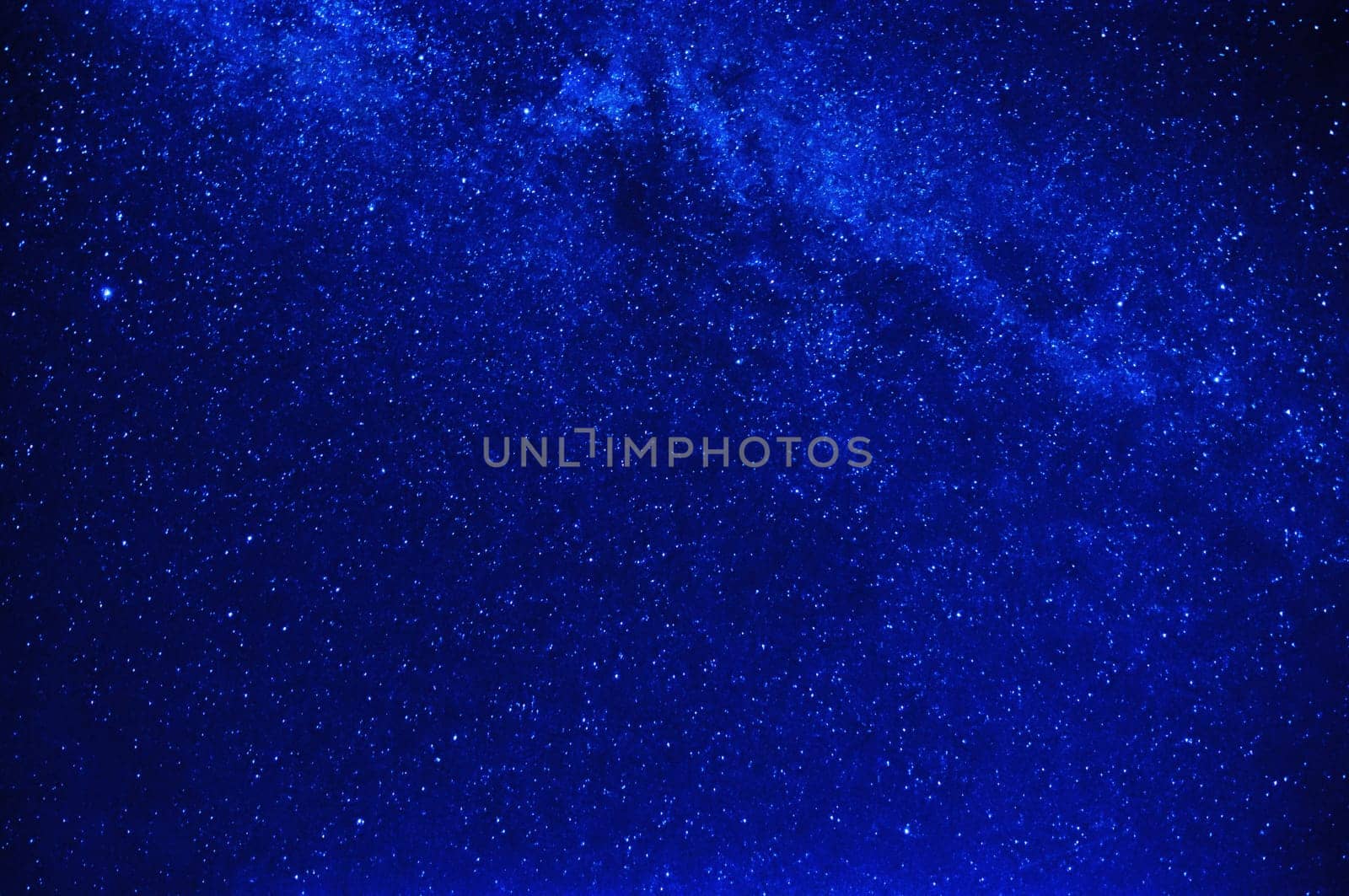 bright blue starry sky with the milky way